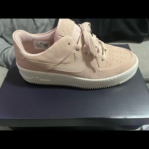 Nike woman sage low pink sneakers size 9 1/2.